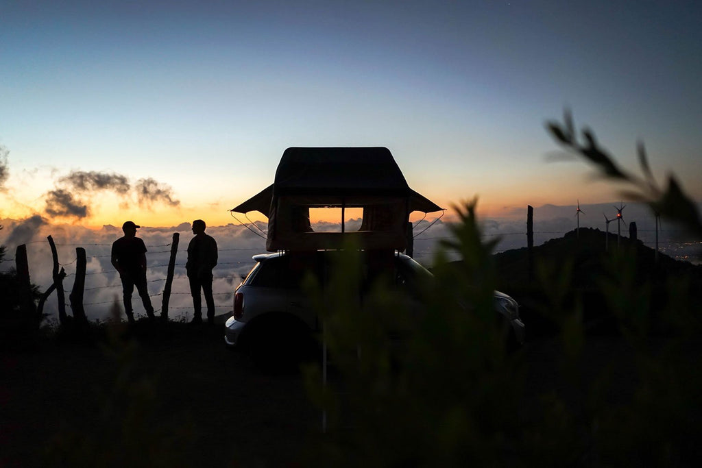 at night the Guana Equipment Wanaka Roof Top Tent With XL Annex
