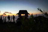 at night the Guana Equipment Wanaka Roof Top Tent With XL Annex