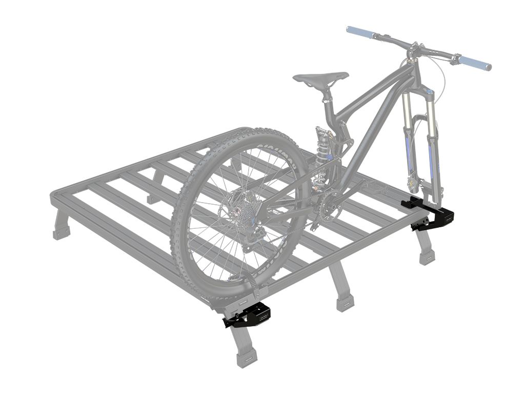Save space by placing the bicycle on the side of the Front Runner Load Bed Rack Kit with this adjustable Bike Carrier / Load Bed Rack Side Mount