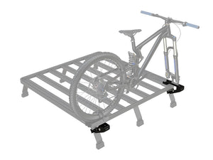 Save space by placing the bicycle on the side of the Front Runner Load Bed Rack Kit with this adjustable Bike Carrier / Load Bed Rack Side Mount