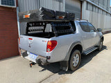 Ozroo Tub Rack Mounted on Mitsubishi w Rooftop Tent