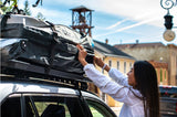 Rhino-rack weatherproof luggage bag on Rhino-rack platform and rails.