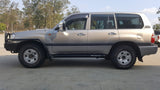 SCF Standard Rock Sliders For Toyota LandCruiser 100 Series Side View of LandCruiser