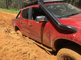 Holden Colorado RG (2012-2022) in Mud with Rock sliders mounted