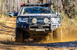 Front View Of The Ford Everest WIth A Piak Elite Bull Bar Driving Through Mud
