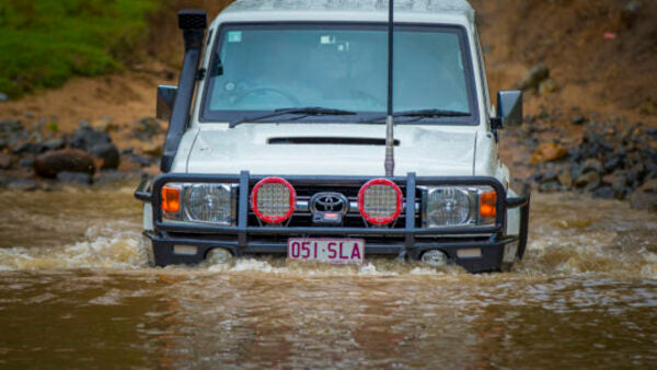 Landcruiser in a Water Crossing With A Safari Snorkel
